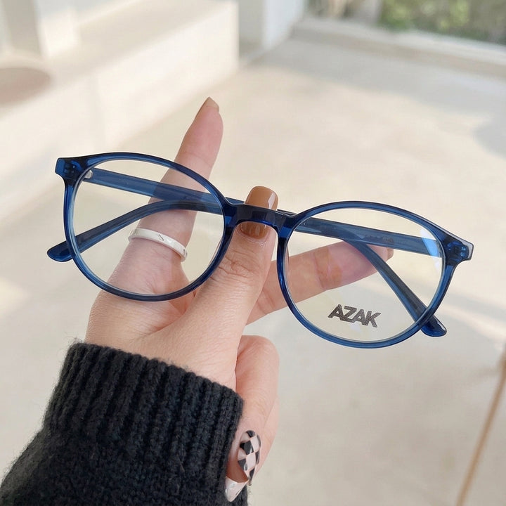 Armação Infantil AZAK HR-Z539 Oval Azul Translúcido - na mão