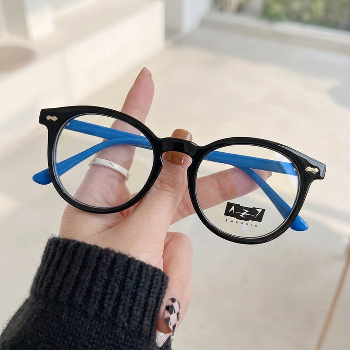 Armação Infantil AZAK S 8346 P Redonda Preto e Azul - na mão