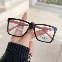 Armação Masculina 1017 Retangular Preto e Vermelho - na mão