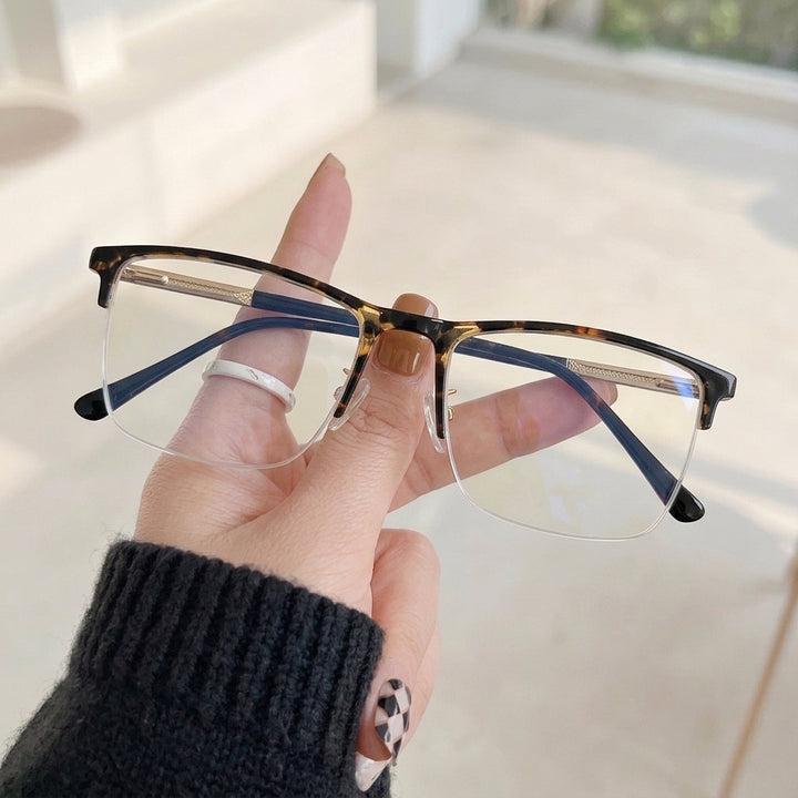 Armação XG9601 Meio Aro (fio de nylon) Tartaruga e Preto - na mão